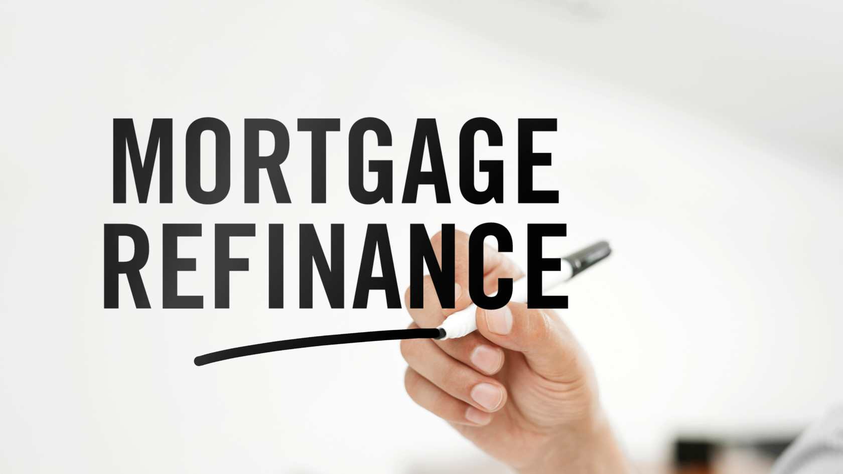 Is it time for a mortgage refinance? a hand writes mortgage refinance on a glass window
